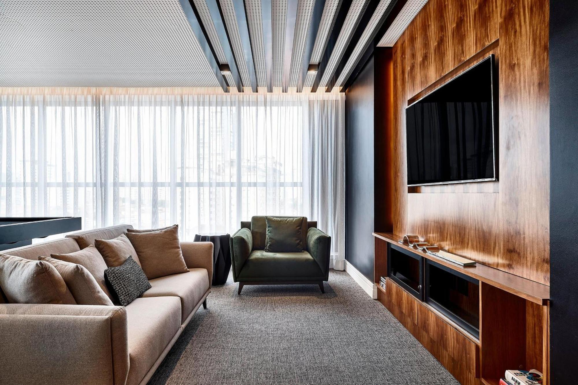 Sheraton Santos Hotel Luaran gambar A living room with a television